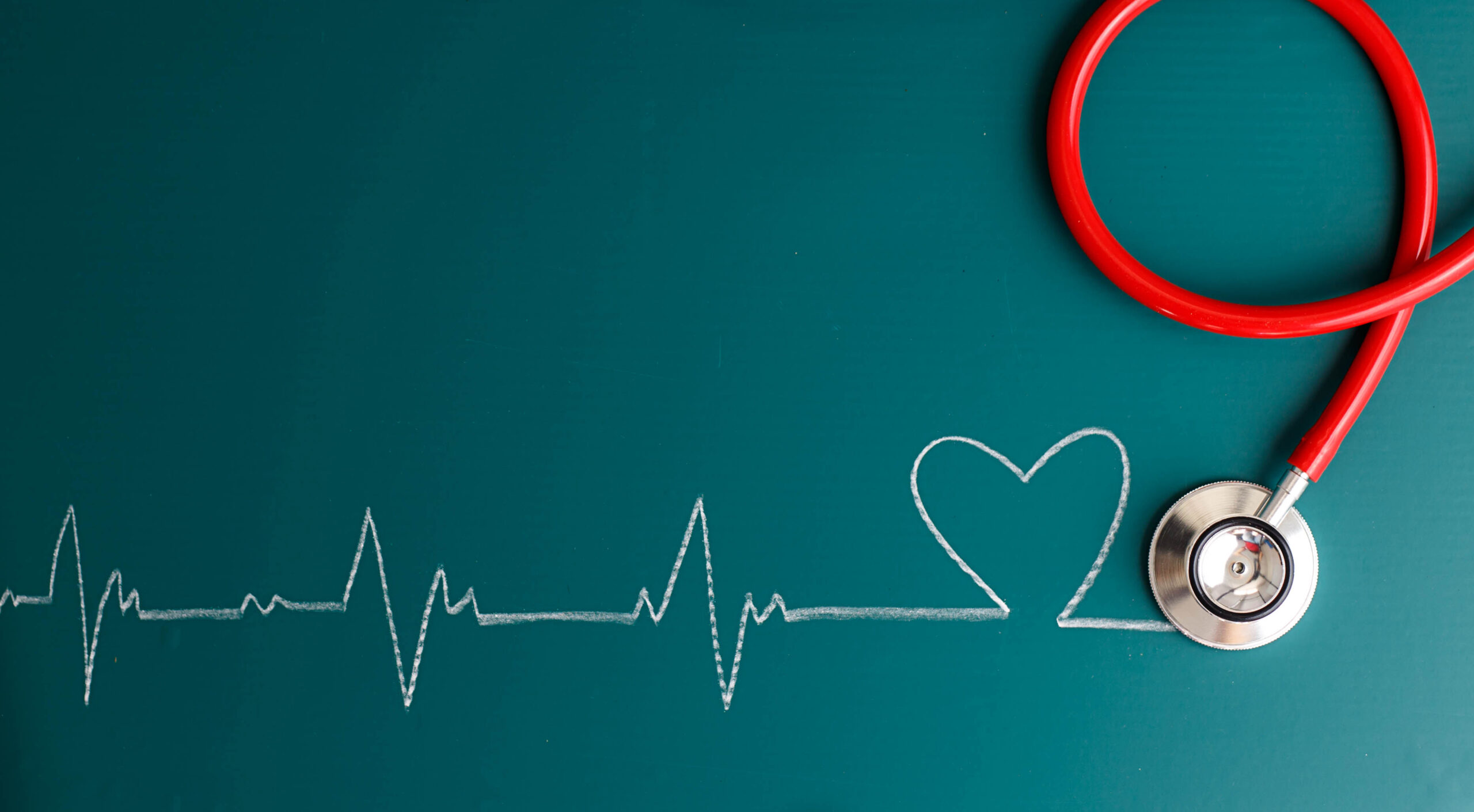 Top view of stethoscope and heartbeat