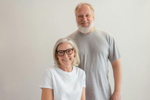 man and woman smiling