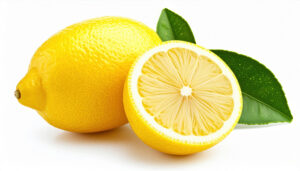 Fresh lemon with vibrant yellow color, sliced to reveal juicy interior and seeds, accompanied by green leaves