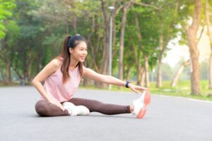 woman stretching and getting ready for a run