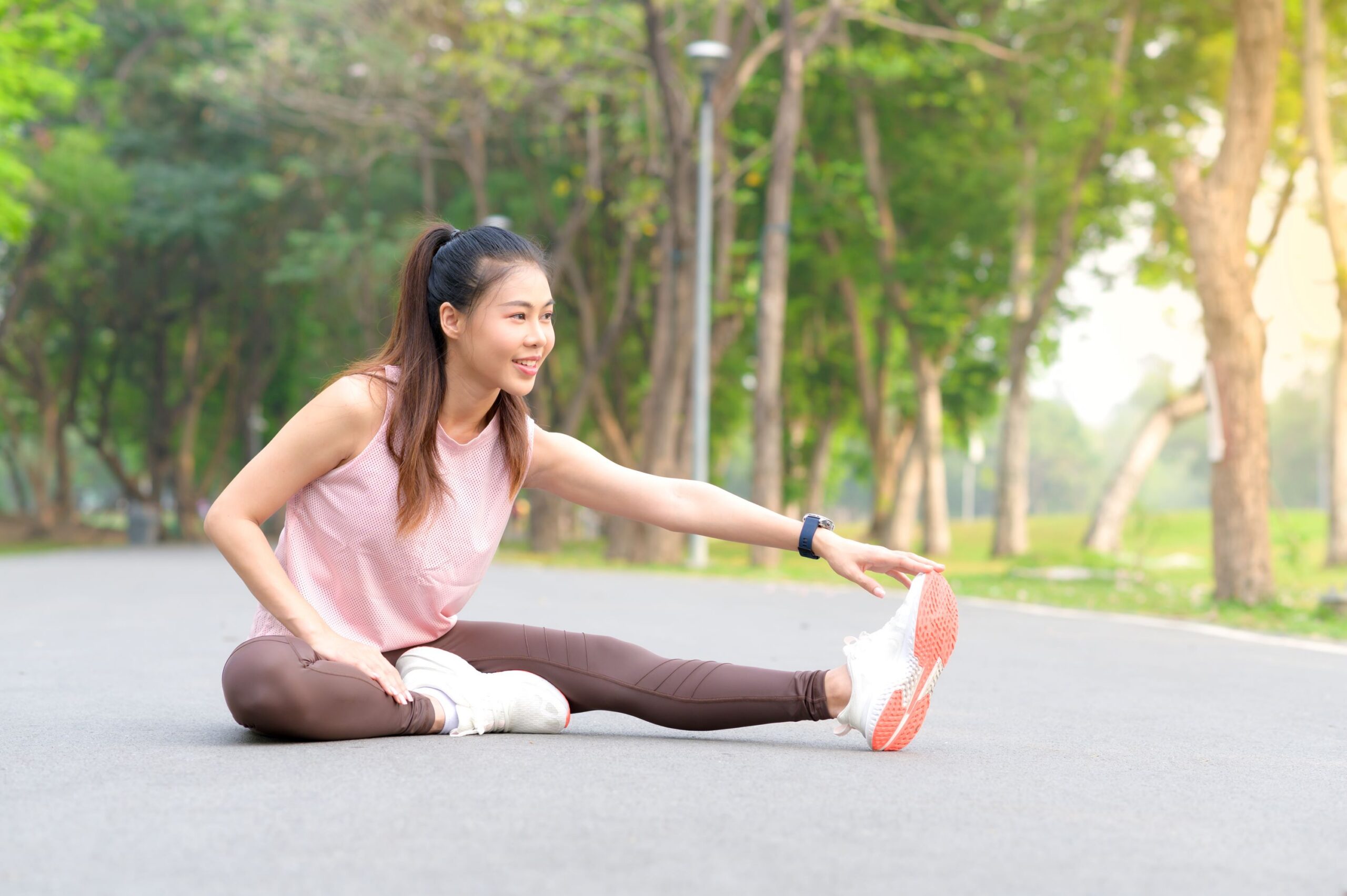 woman stretching and getting ready for a run